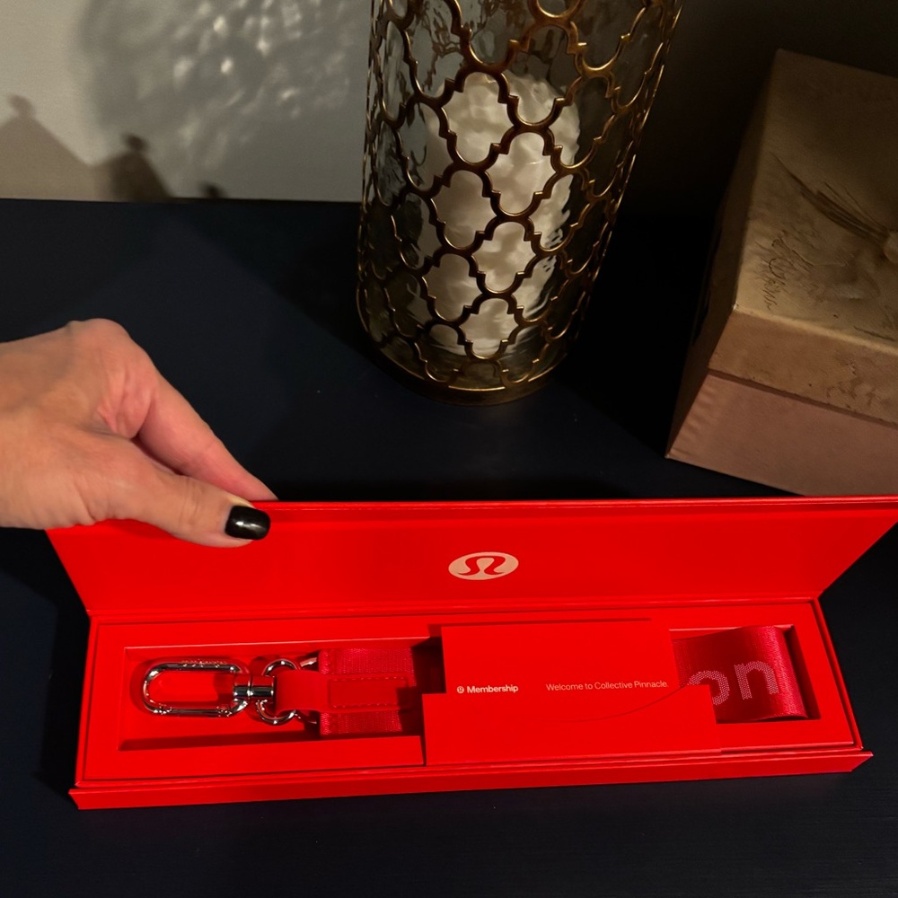 Lululemon Pinnacle Member Exclusive Red Keychain
